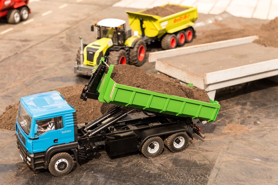 Dump trailer hooked to a hauling truck